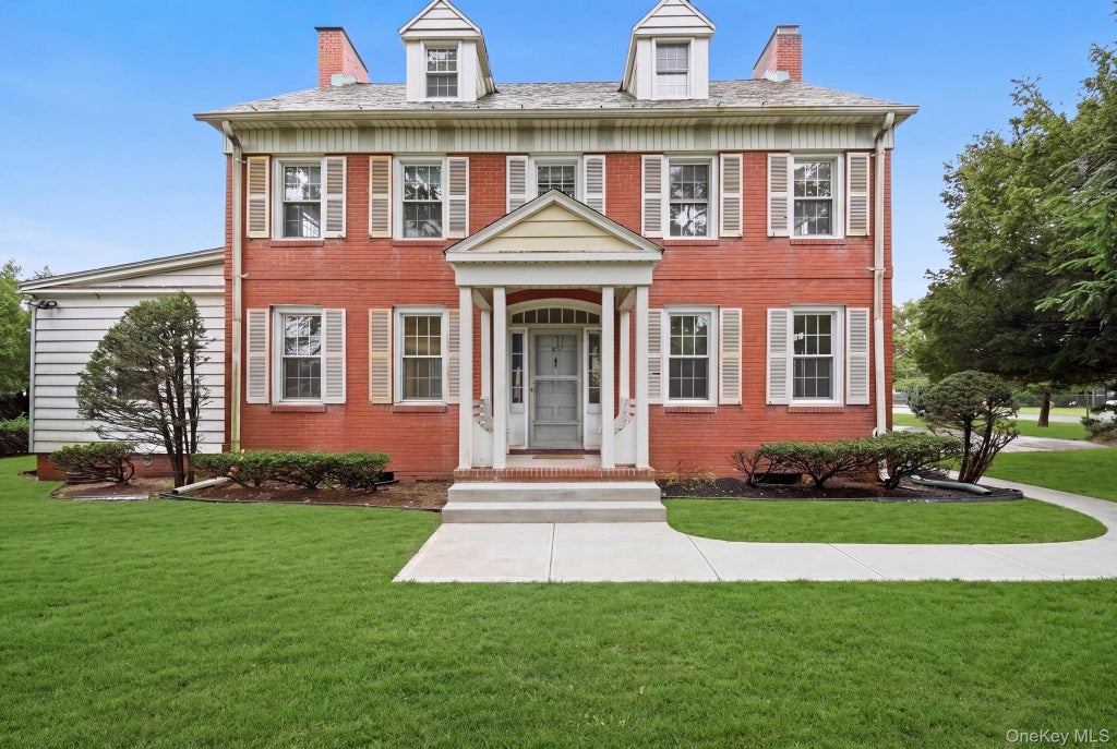 Photo of 45 Tennyson Avenue, Westbury, NY 11590 (MLS # 1056435)