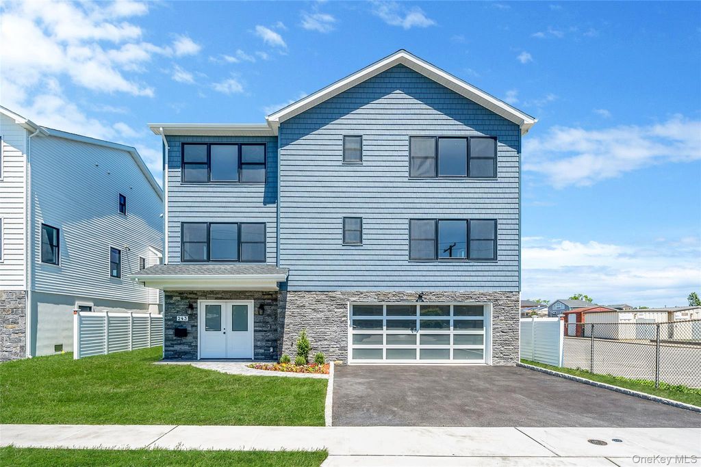 Photo of 243 Mott Street, Oceanside, NY 11572 (MLS # 970180)