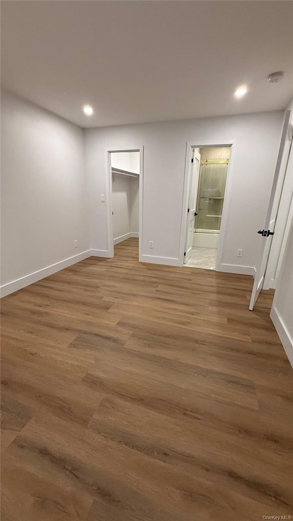 Photo of 94 Sally Lane, Ridge, NY 11961 (MLS # 969396)