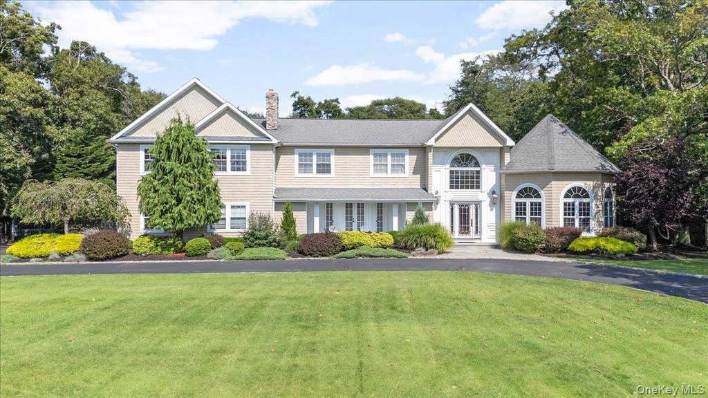 Photo of 7 The Keel, East Islip, NY 11730 (MLS # 1040562)