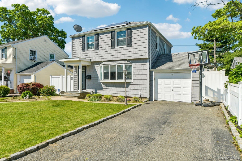 Photo of 93 Crest Road W, Merrick, NY 11566 (MLS # 1009699)