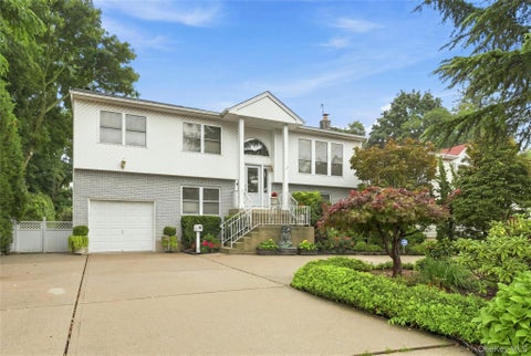 Photo of 991 Newbridge Road, North Bellmore, NY 11710 (MLS # 1045615)