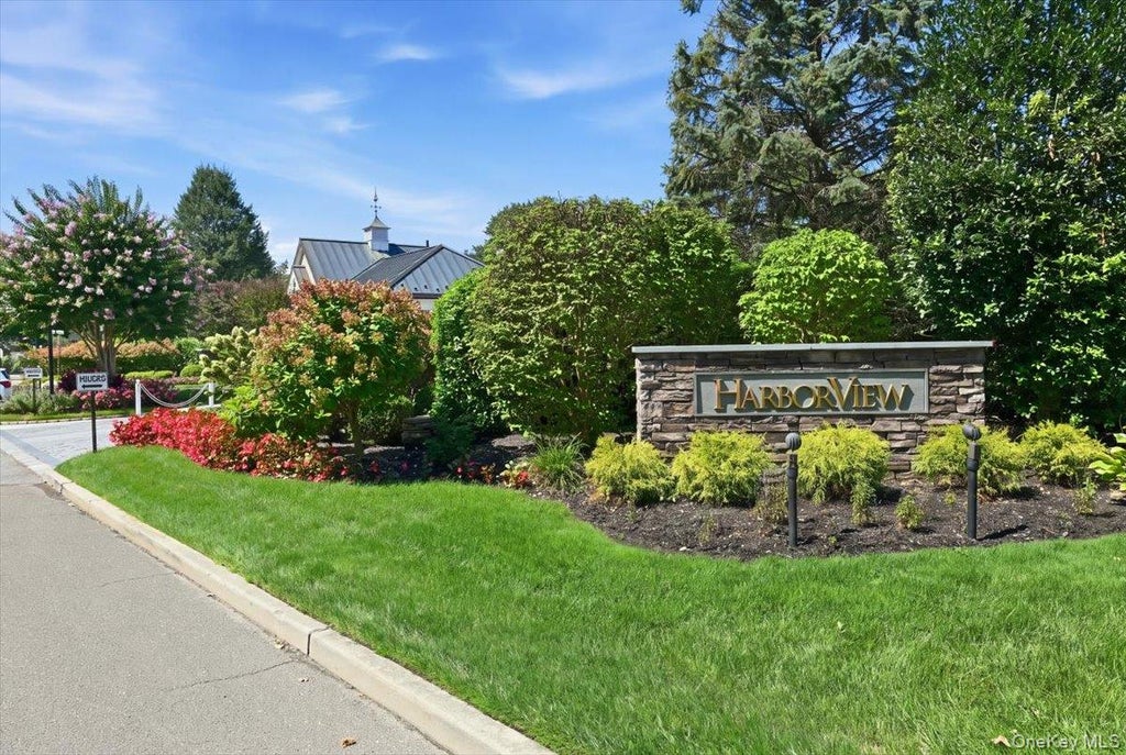 Photo of 15 W Overlook, Port Washington, NY 11050 (MLS # 1043014)