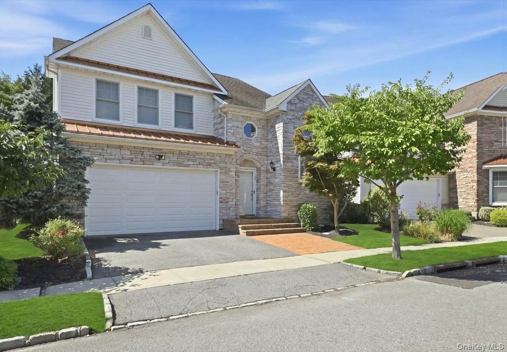 Photo of 15 W Overlook, Port Washington, NY 11050 (MLS # 1043014)