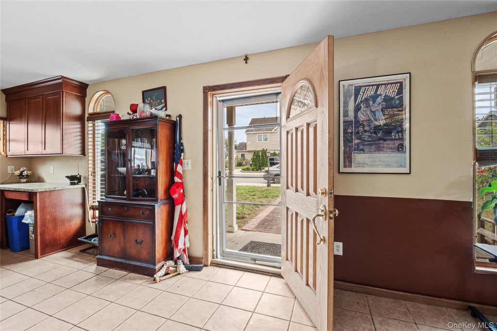 Photo of 547 Sunnybrook Drive, Oceanside, NY 11572 (MLS # 1025229)
