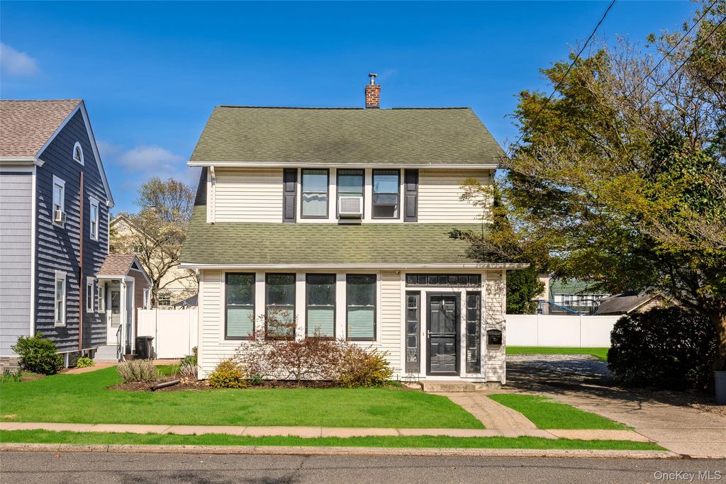 Photo of 154 Elmwood Street, Westbury, NY 11590 (MLS # 987697)