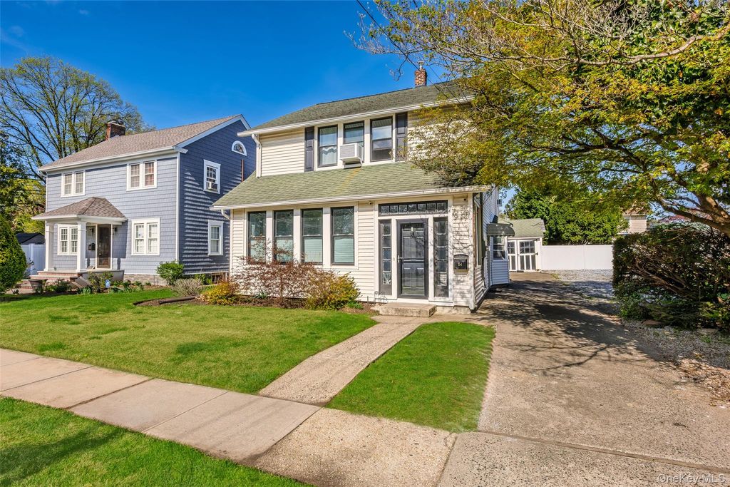 Photo of 154 Elmwood Street, Westbury, NY 11590 (MLS # 987697)