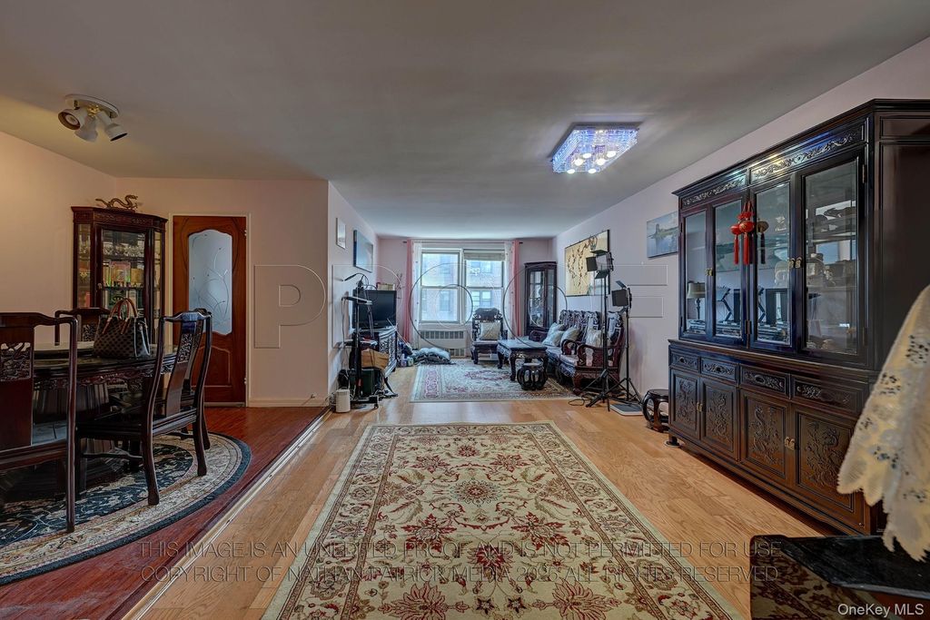 Photo of 6565 Wetherole Street #2E, Rego Park, NY 11374 (MLS # 965249)