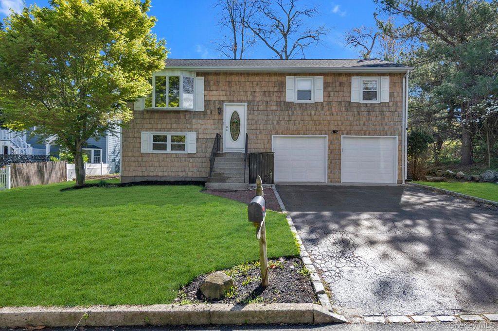 Photo of 77 Magnolia Drive, Kings Park, NY 11754 (MLS # 993078)