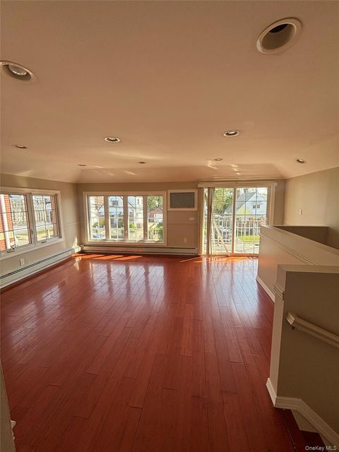 Photo of 12032 201st Street, Saint Albans, NY 11412 (MLS # 990445)