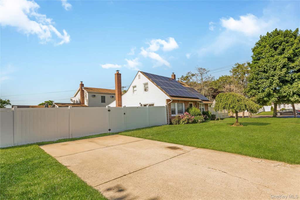 Photo of 65 Club Lane, Levittown, NY 11756 (MLS # 1012178)