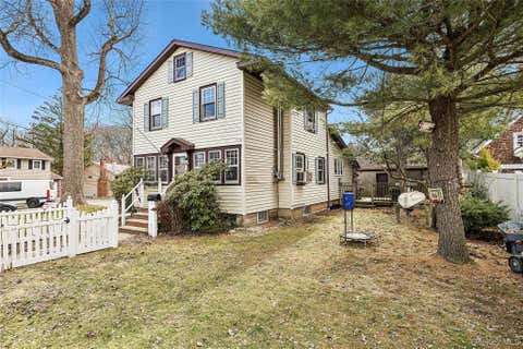 Townhouse For Sale - 74 Valentine Avenue<br/> Glen Cove, NY 11542