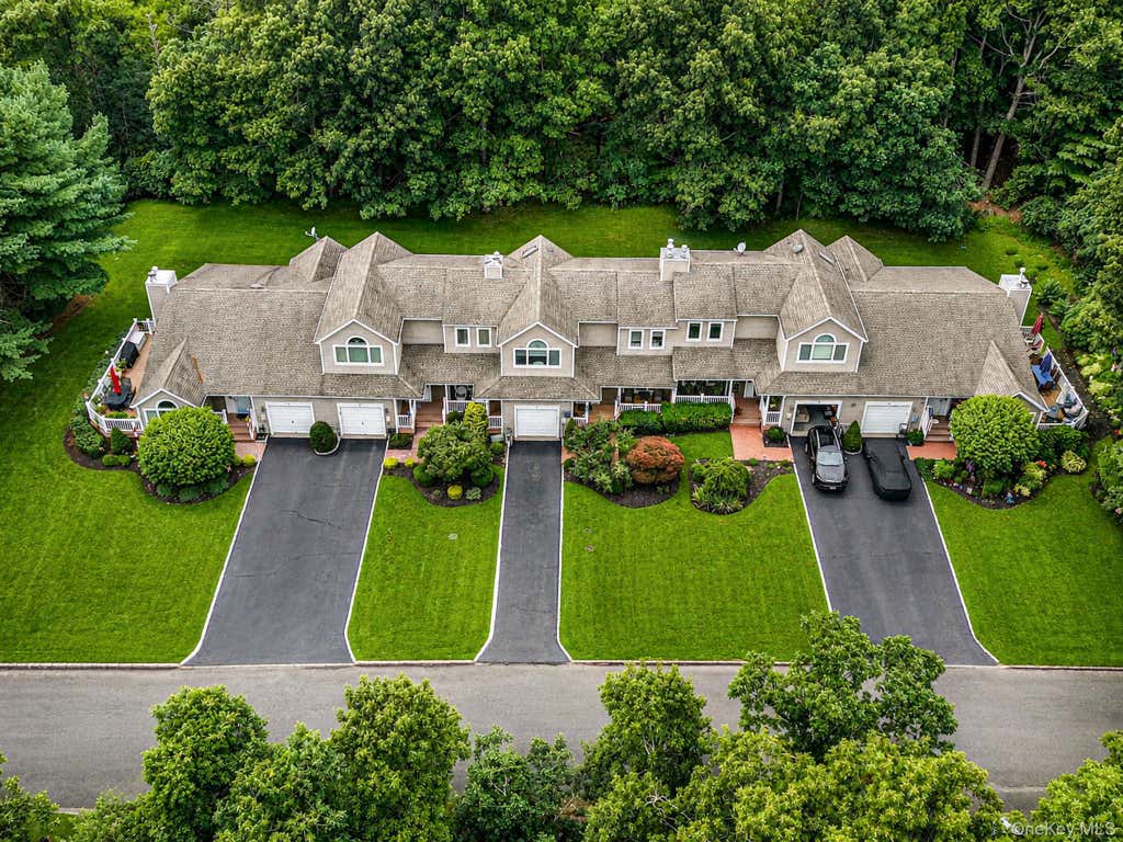 Photo of 26 Kettle Hole Road, Manorville, NY 11949 (MLS # 1041984)