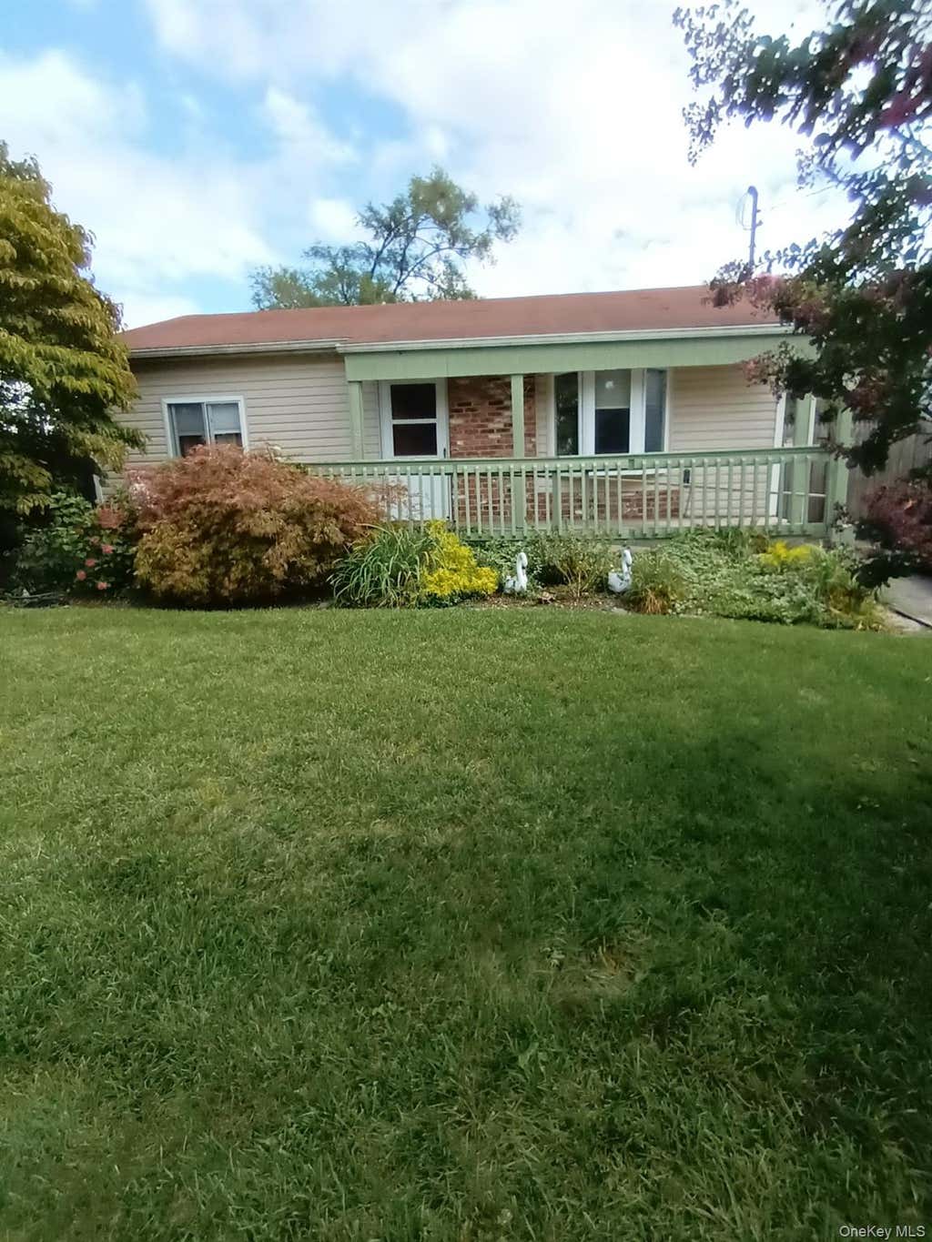 Photo of 998 Bowling Green Drive, Westbury, NY 11590 (MLS # 1042066)