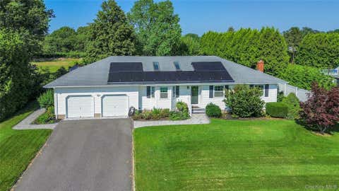 Photo of 124 Donna Drive, Baiting Hollow, NY 11933 (MLS # 1028176)