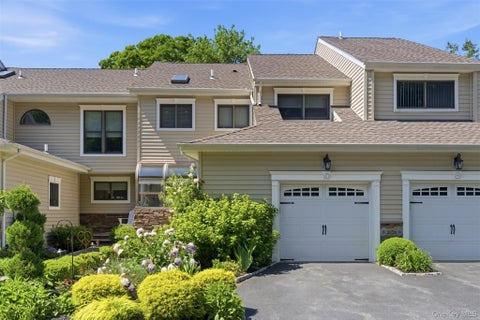 Photo of 67 Villas Circle, Melville, NY 11747 (MLS # 1009369)