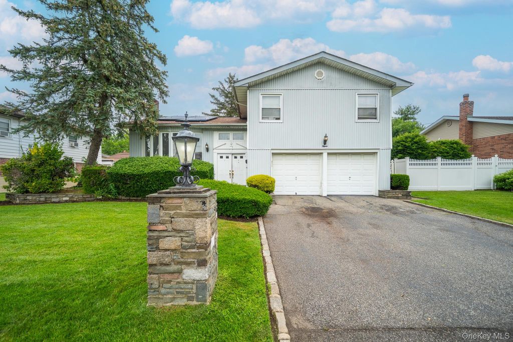 Photo of 15 Jackie Drive, Westbury, NY 11590 (MLS # 1003879)
