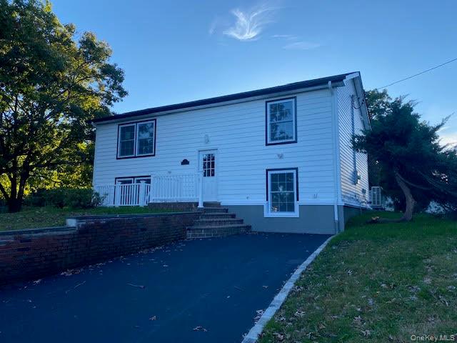 Photo of 14 split cedar DR, Islandia, NY 11749 (MLS # 1061787)