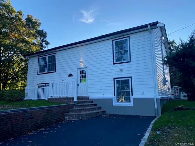 Photo of 14 split cedar DR, Islandia, NY 11749 (MLS # 1061787)