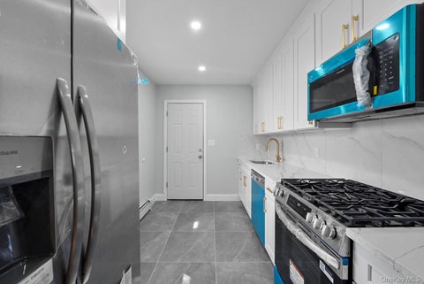 Photo of 11912 143rd Street, Jamaica, NY 11436 (MLS # 1064924)