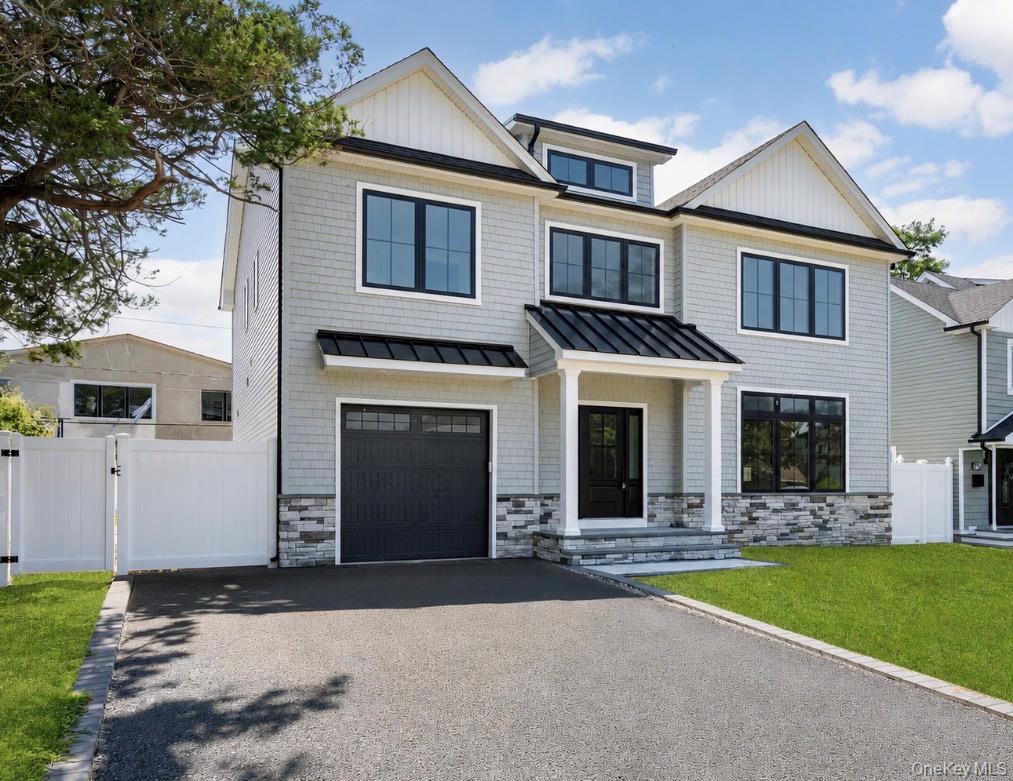Photo of 11 Forest Lane, Westbury, NY 11590 (MLS # 1033258)