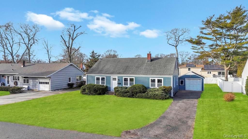 Photo of 110 Monroe Avenue, Patchogue, NY 11772 (MLS # 943055)