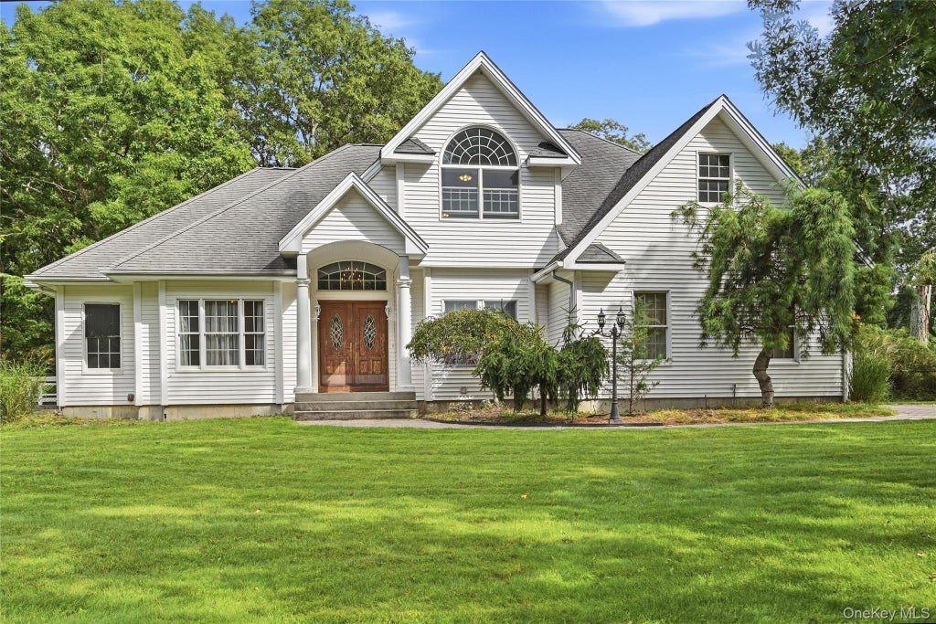 Photo of 57 E Margin Road, Ridge, NY 11961 (MLS # 1053064)