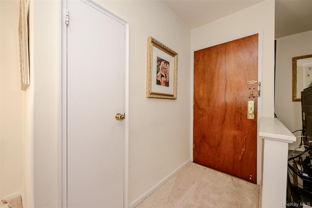 Photo of 18-11 212 Street St #101, Bayside, NY 11360 (MLS # 1057130)