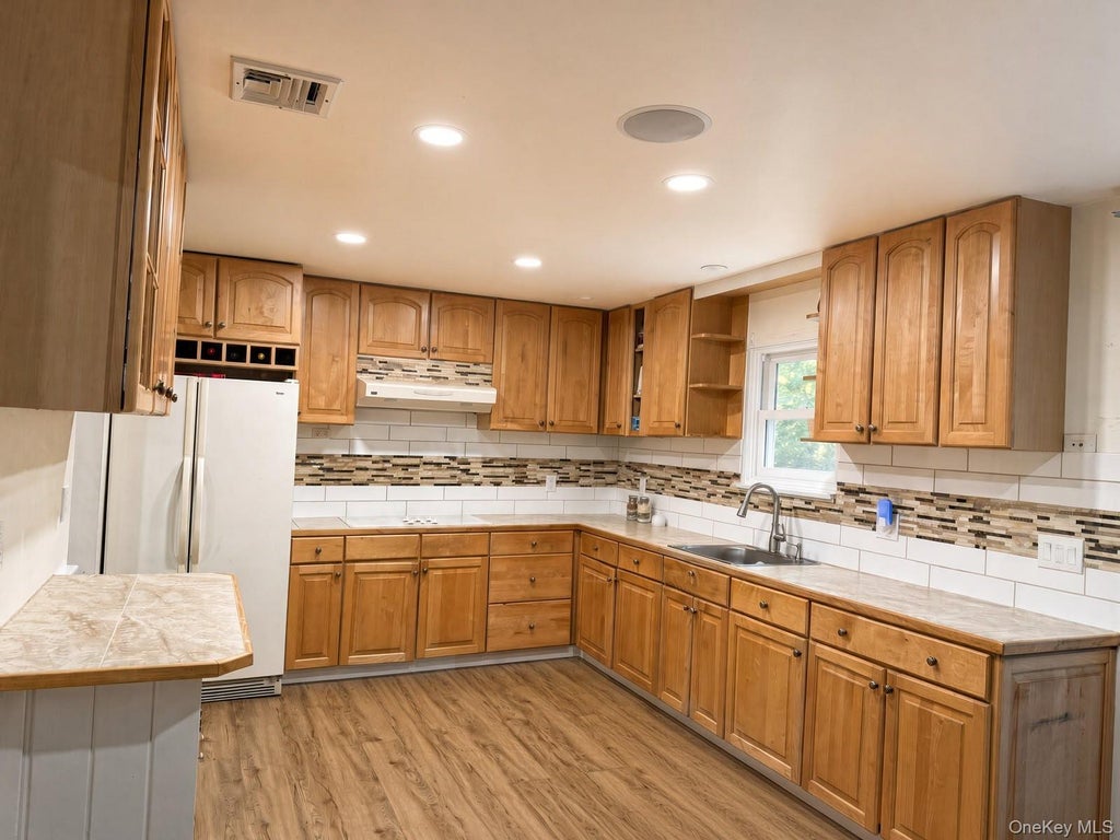 Photo of 531 Brookhaven Avenue, Flanders, NY 11901 (MLS # 1058360)