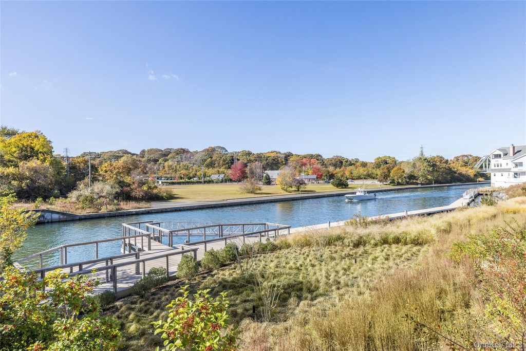 Photo of 57 Old Boathouse Lane S, Hampton Bays, NY 11946 (MLS # 1019903)