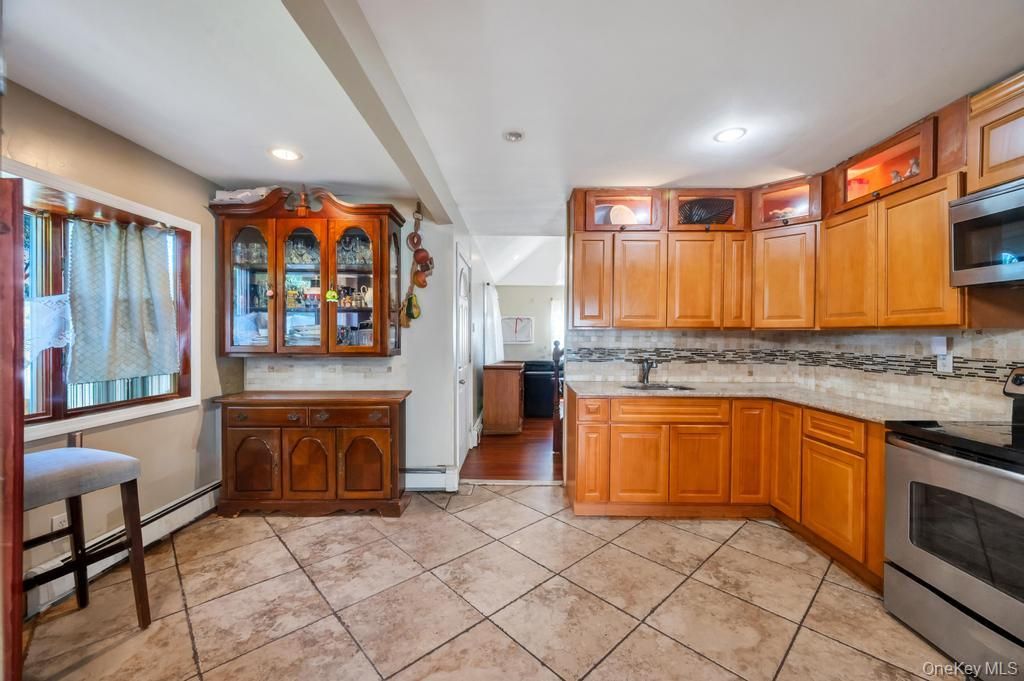 Photo of 156 Shelter Lane, Levittown, NY 11756 (MLS # 1007803)