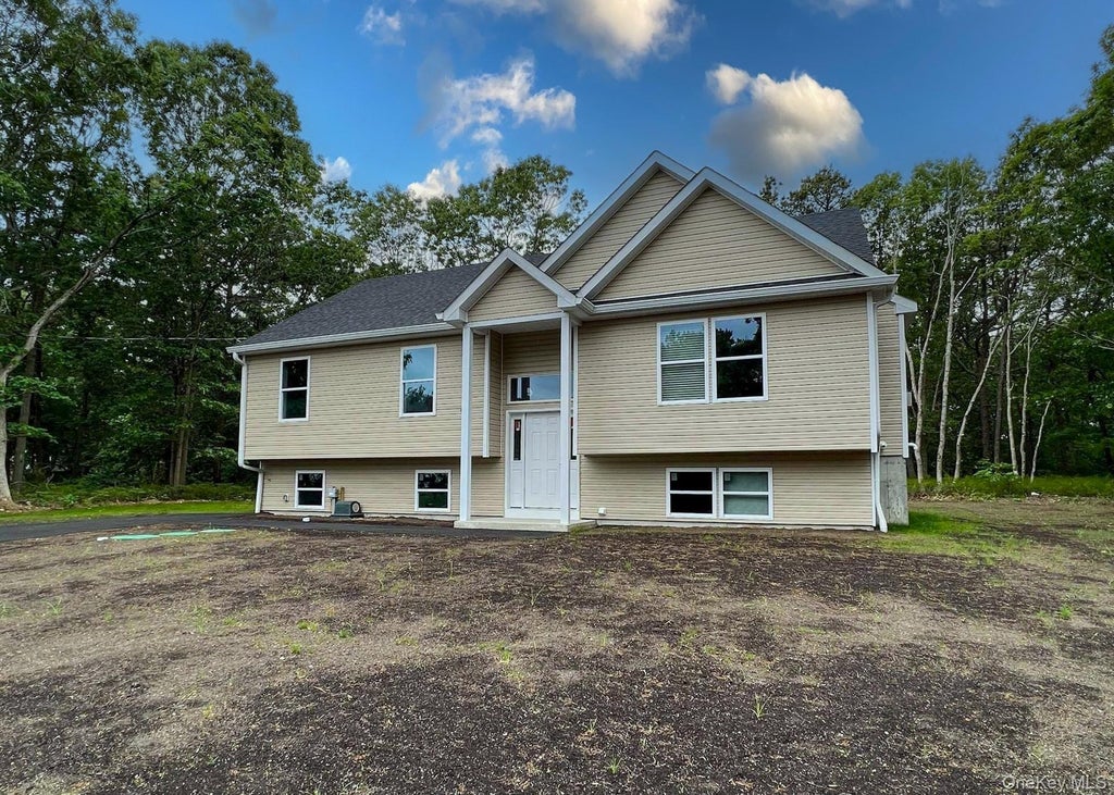Photo of 56 Aspen Drive, Mastic Beach, NY 11951 (MLS # 1064240)
