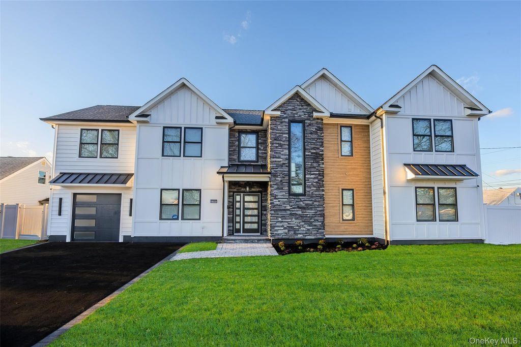 Photo of 2369 Stewart Avenue, Westbury, NY 11590 (MLS # 942937)