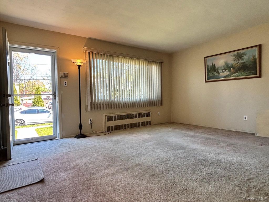 Photo of 245 Garden Street, Westbury, NY 11590 (MLS # 995516)