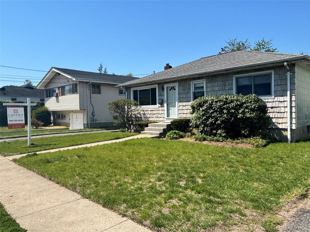 Photo of 245 Garden Street, Westbury, NY 11590 (MLS # 995516)