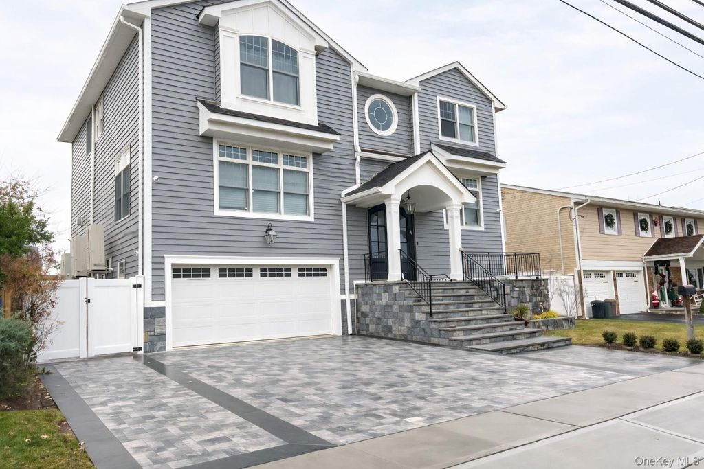 Photo of 3810 Greentree Drive, Oceanside, NY 11572 (MLS # 985959)