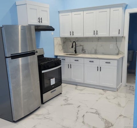 Photo of 10854 217th Place, Queens Village, NY 11429 (MLS # 1047580)
