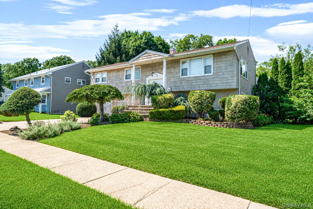 Photo of 523 Livingston Street, Westbury, NY 11590 (MLS # 1026708)