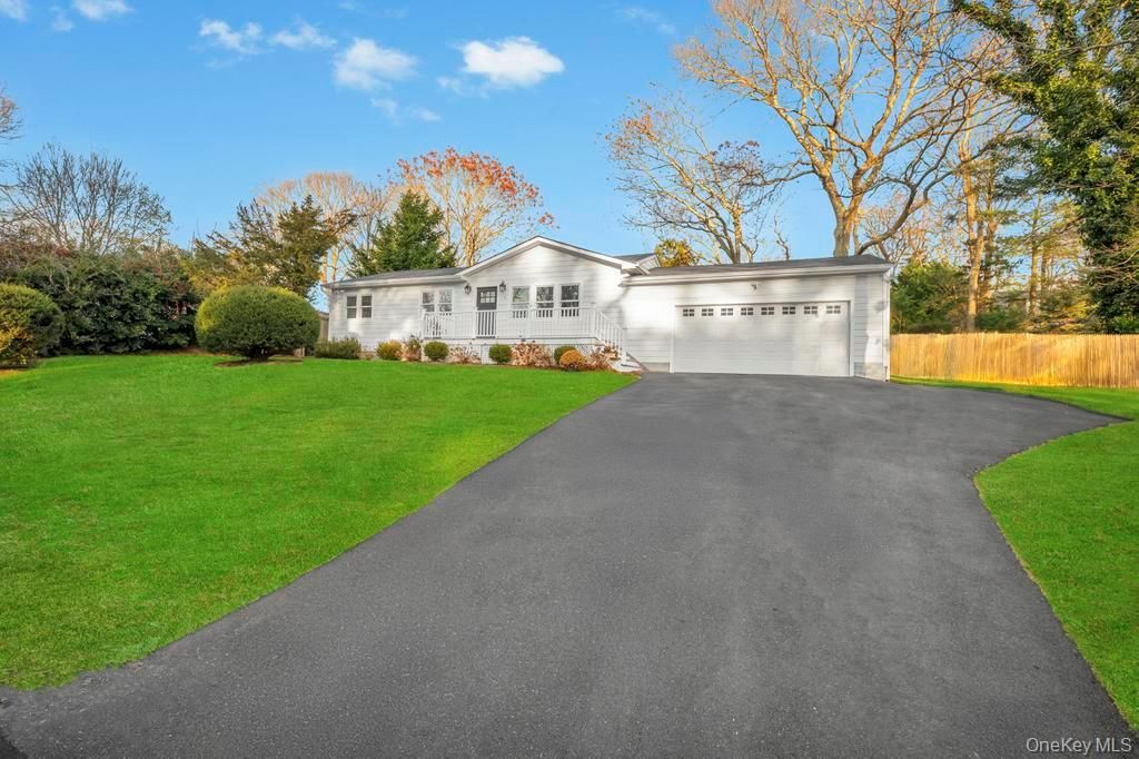 Photo of 12 George Street, Hampton Bays, NY 11946 (MLS # 942607)