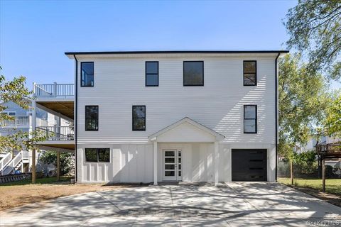Photo of 7 Sherborne Place, Island Park, NY 11558 (MLS # 920405)