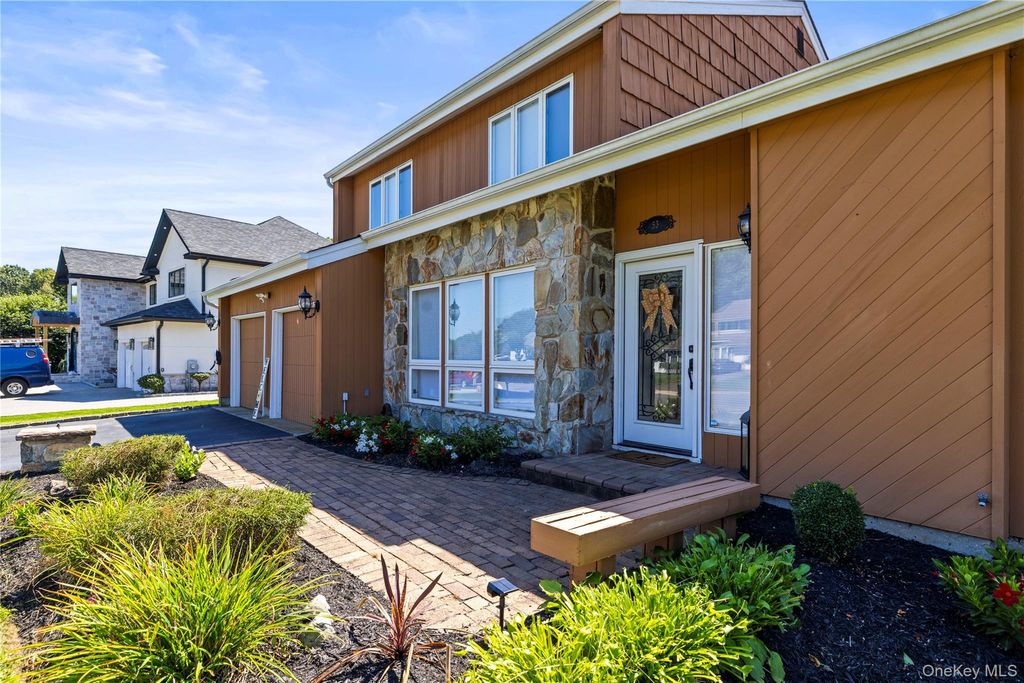 Photo of 53 Timber Ridge Drive, Commack, NY 11725 (MLS # 968940)