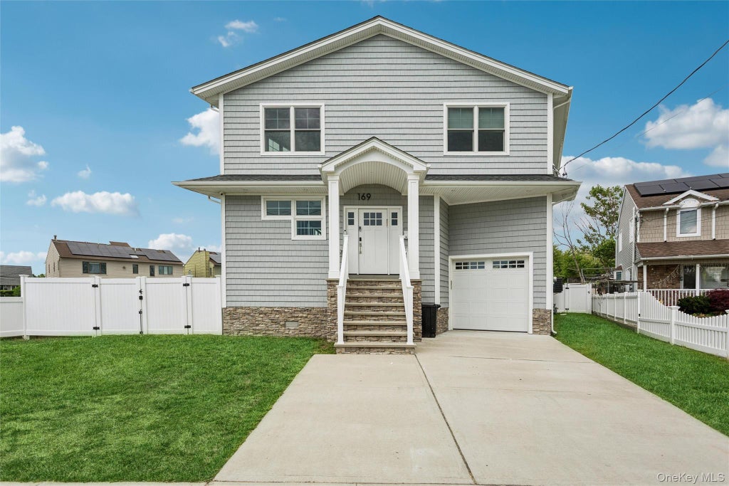 Photo of 169 Mott Street, Oceanside, NY 11572 (MLS # 1062485)