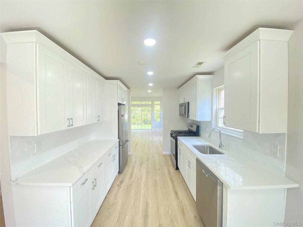 Photo of 10 Gettysburg Drive, Port Jefferson Station, NY 11776 (MLS # 987045)