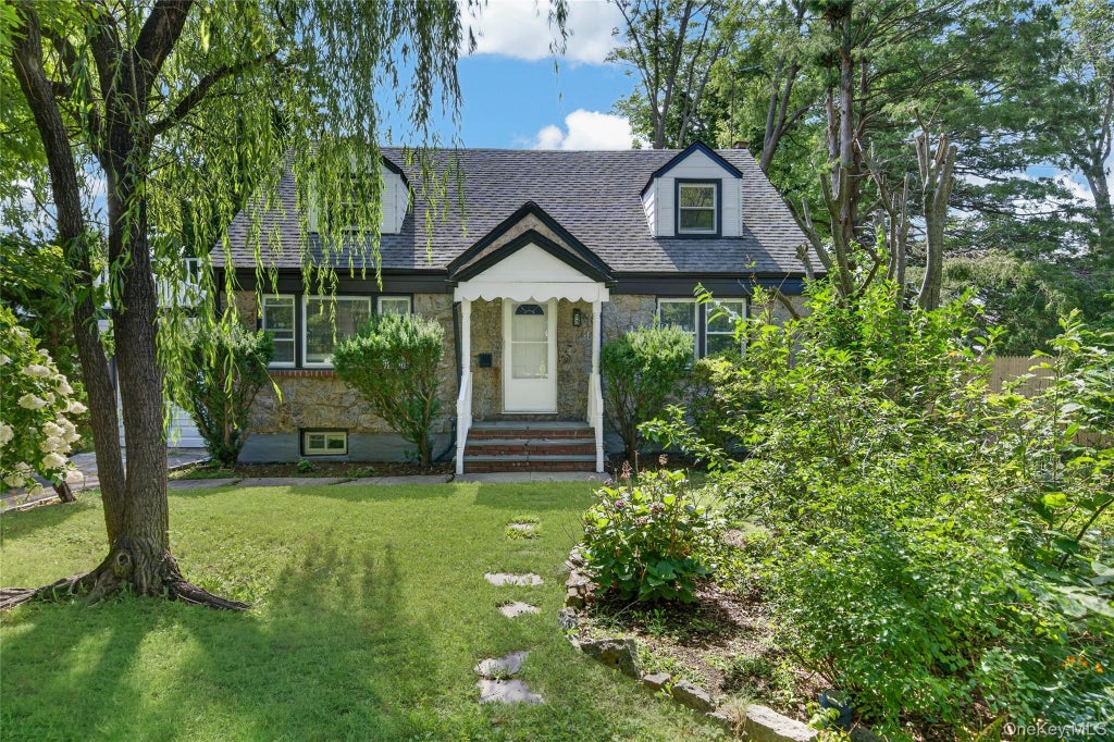 Photo of 343 Sylvan Lane, Westbury, NY 11590 (MLS # 1066918)