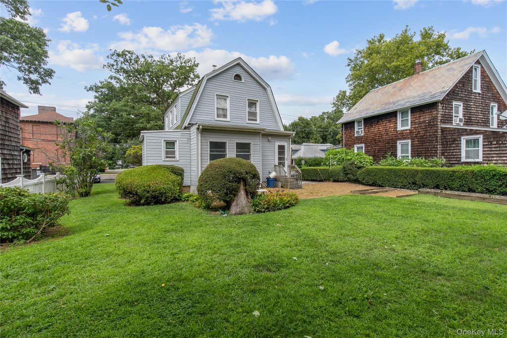 Photo of 48 Saint Marks Place, Roslyn Heights, NY 11577 (MLS # 1042847)
