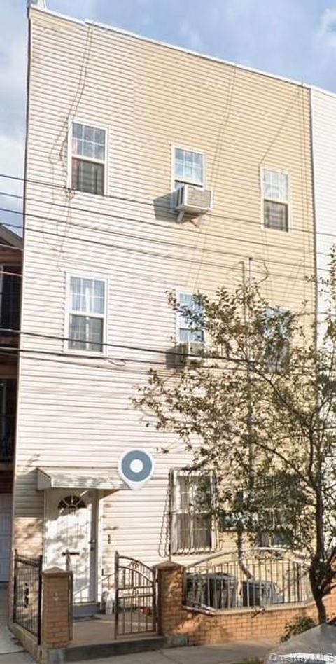 Photo of 676 Jamaica Avenue, Brooklyn, NY 11208 (MLS # 968448)