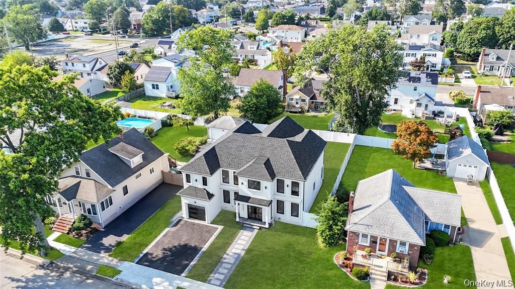 Photo of 8 Schoolhouse Road, Levittown, NY 11756 (MLS # 954765)