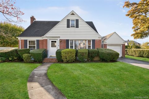 Photo of 60 Concord Street, Westbury, NY 11590 (MLS # 910567)