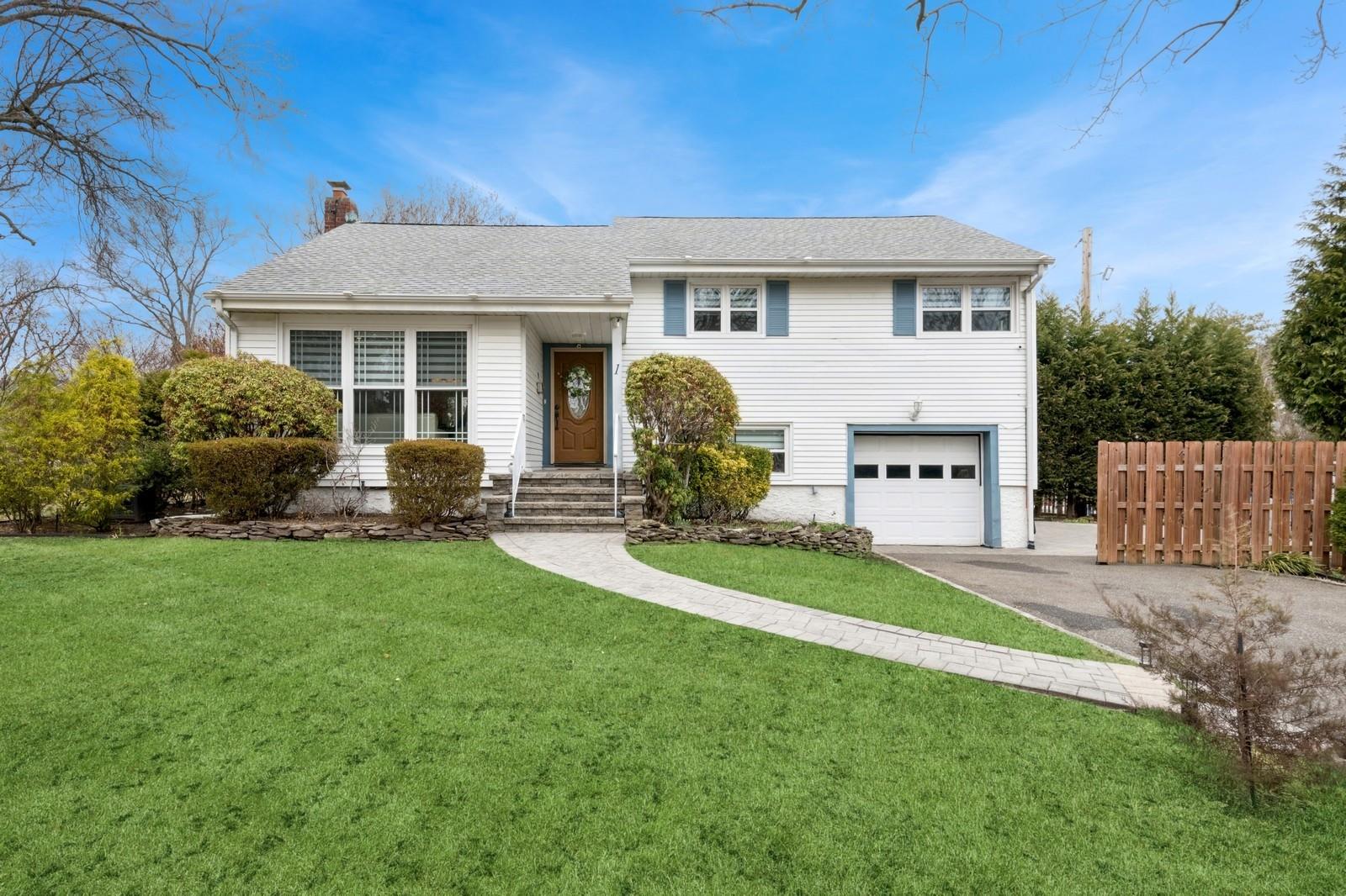 1 Flower Road, Garden City, New York image 1