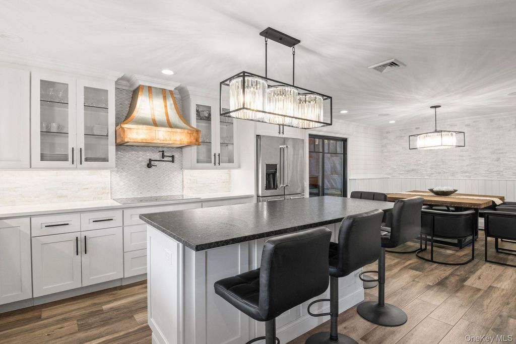 Photo of 131 Fleets Cove Road, Huntington, NY 11743 (MLS # 963414)